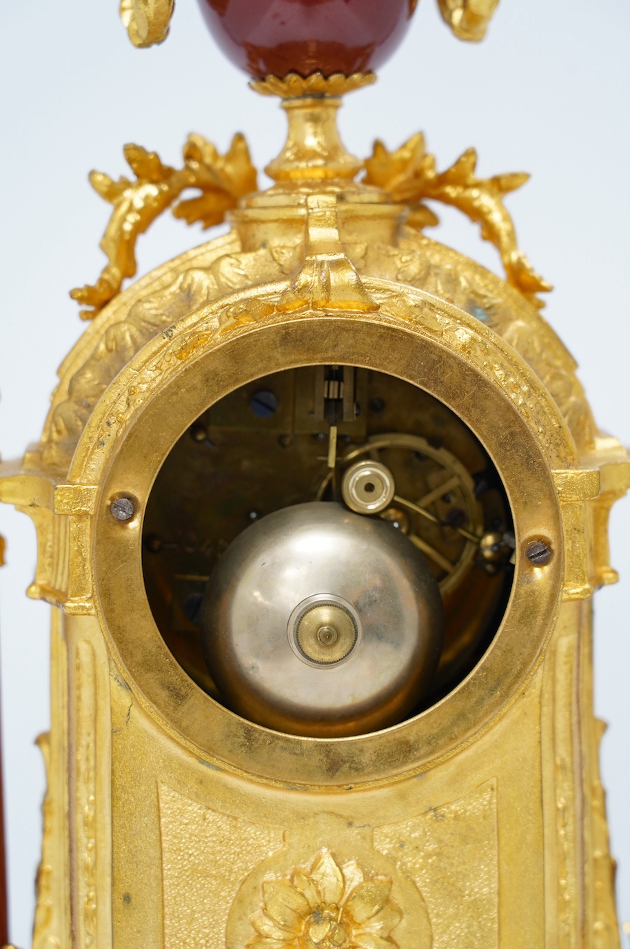 A 19th century French gilt spelter and porcelain mantel clock with pendulum, no key, 42cm. Condition - good, not tested as working